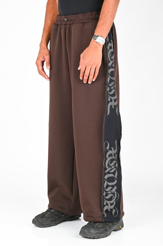 Posture Graphic Trackpant in Black Panel on Brown