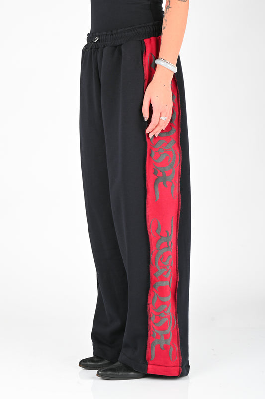 Posture Graphic Trackpant in Red Panel on Black