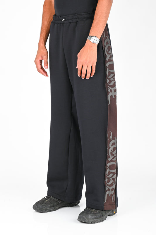 Posture Graphic Trackpant in Brown Panel on Black