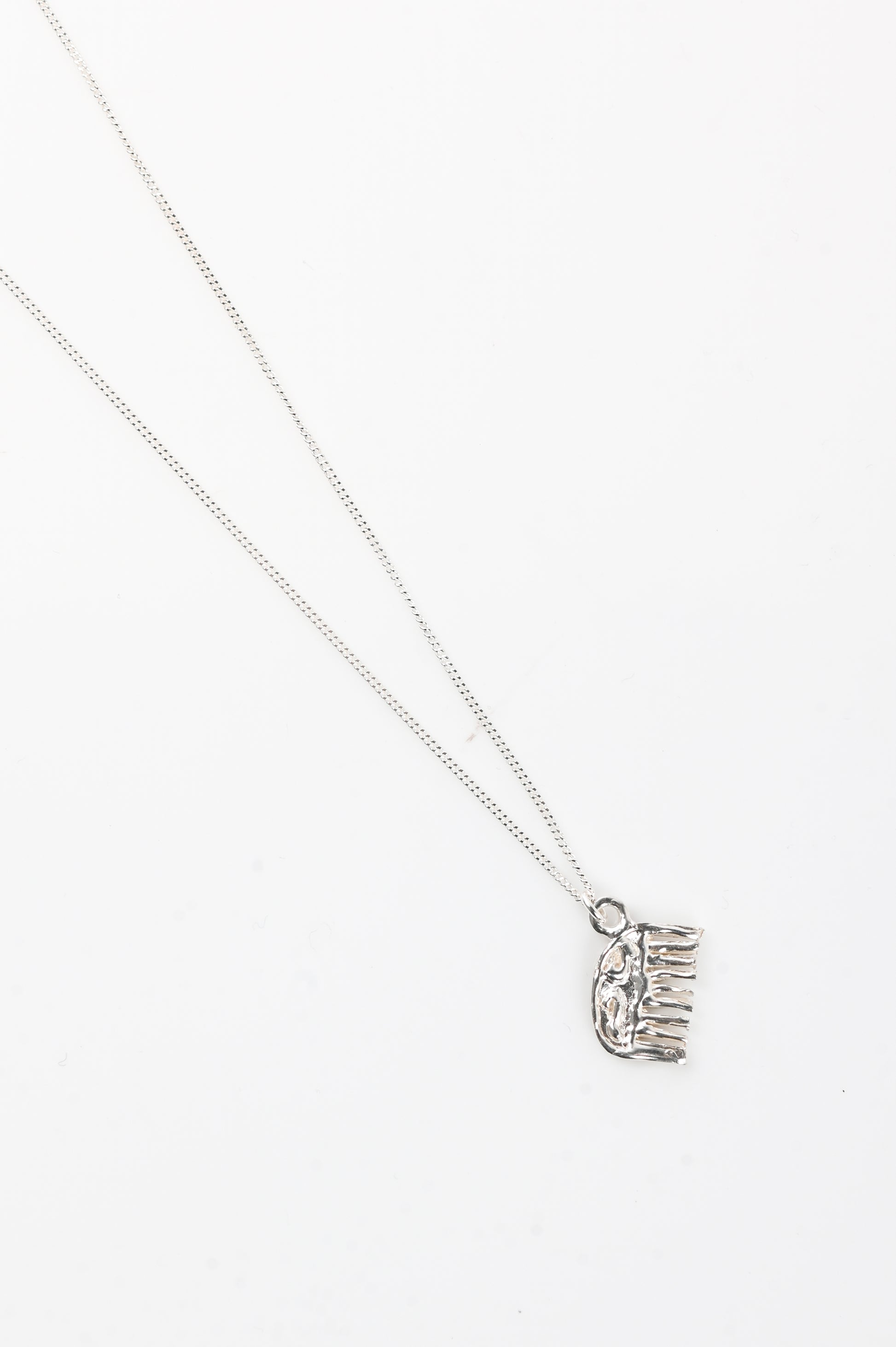 Sacreflux Mini Comb Pendant